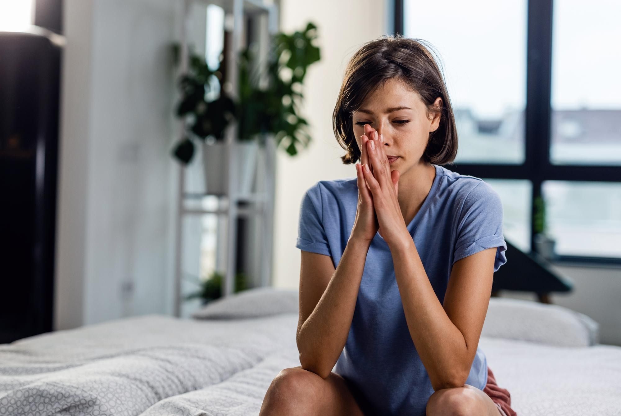 A woman struggles with depression. What we treat